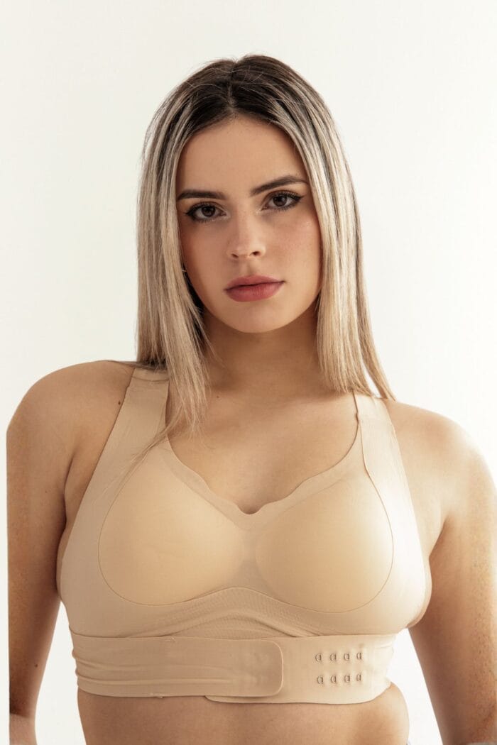 Soutien corrector de postura perfil de frente color beige